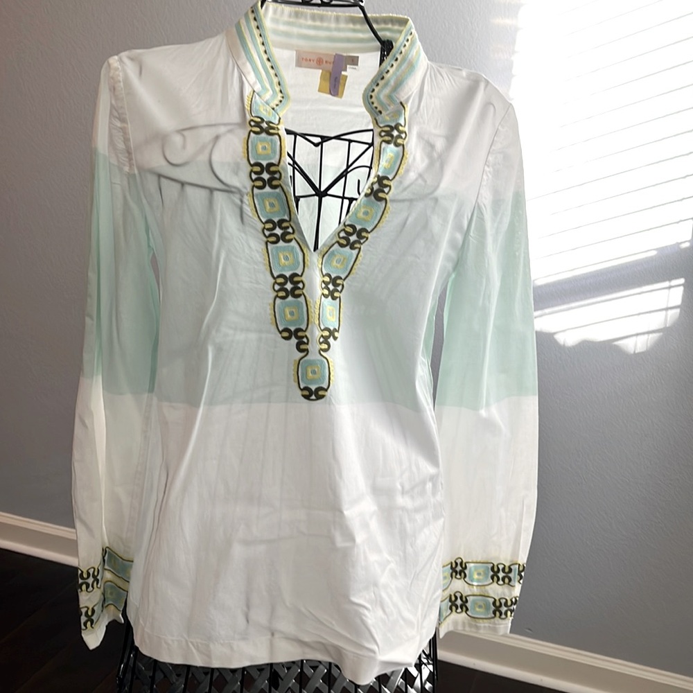This long sleeve Tory Burch shirt, dry clean.